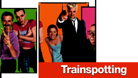 Trainspotting © Warner Bros Mehrere junge Erwachsene posieren mit unterschiedlichen Gesten für die Kamera, der Filmtitel ‚Trainspotting‘ steht in orangefarbener Schrift unterhalb der porträtierten Figuren.